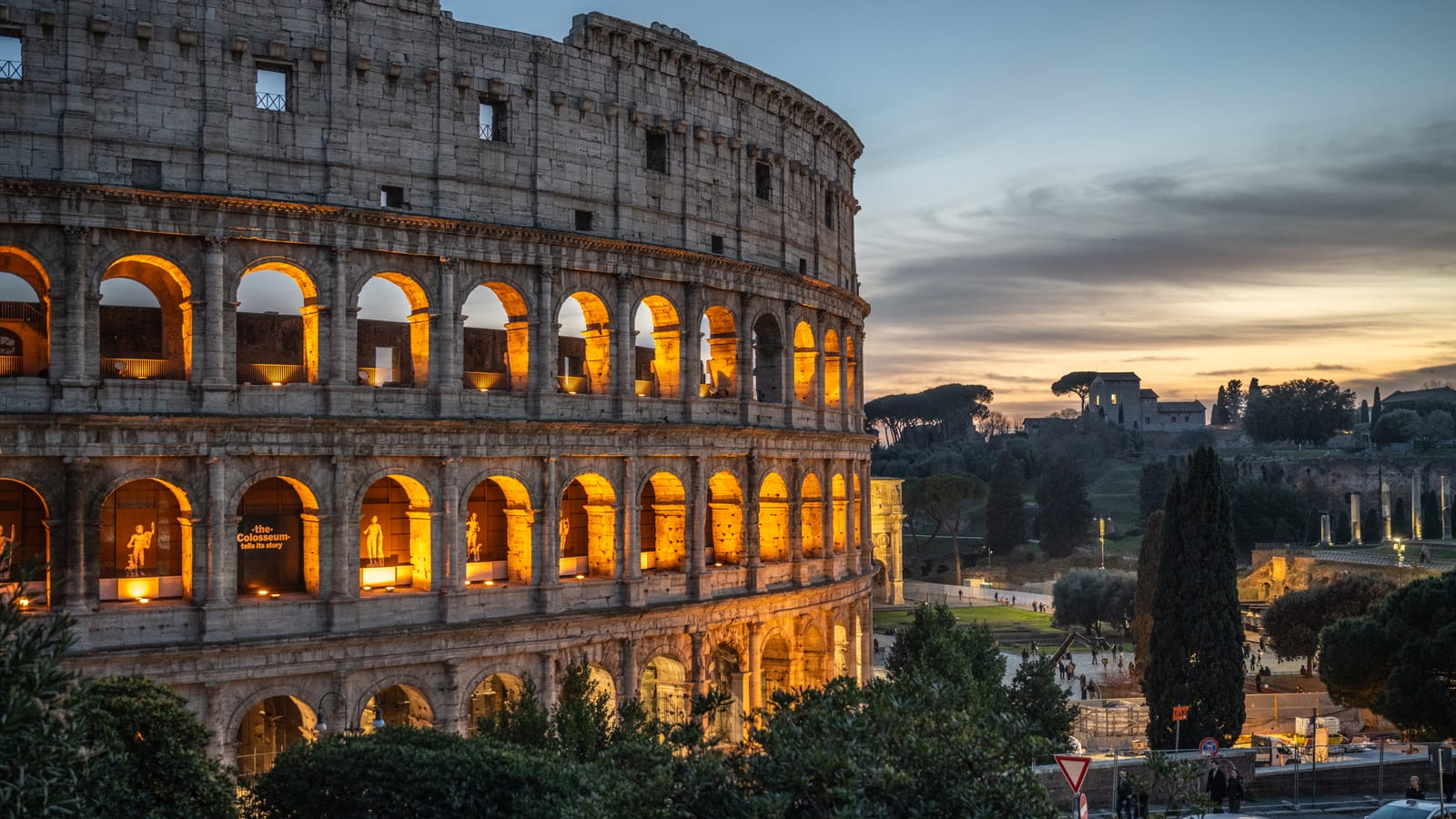 The Colosseum lit at dusk in Rome, Italy