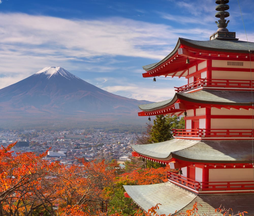 Chureito Pagoda with Mount Fuji behind it and autumn maples in the foreground, Fujiyoshida, Japan
